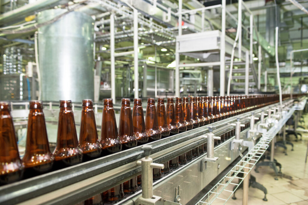 bottle conveyor at beer brewing plant